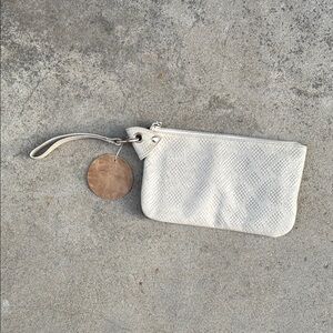 NWT. Cream Leather Wristlet Clutch